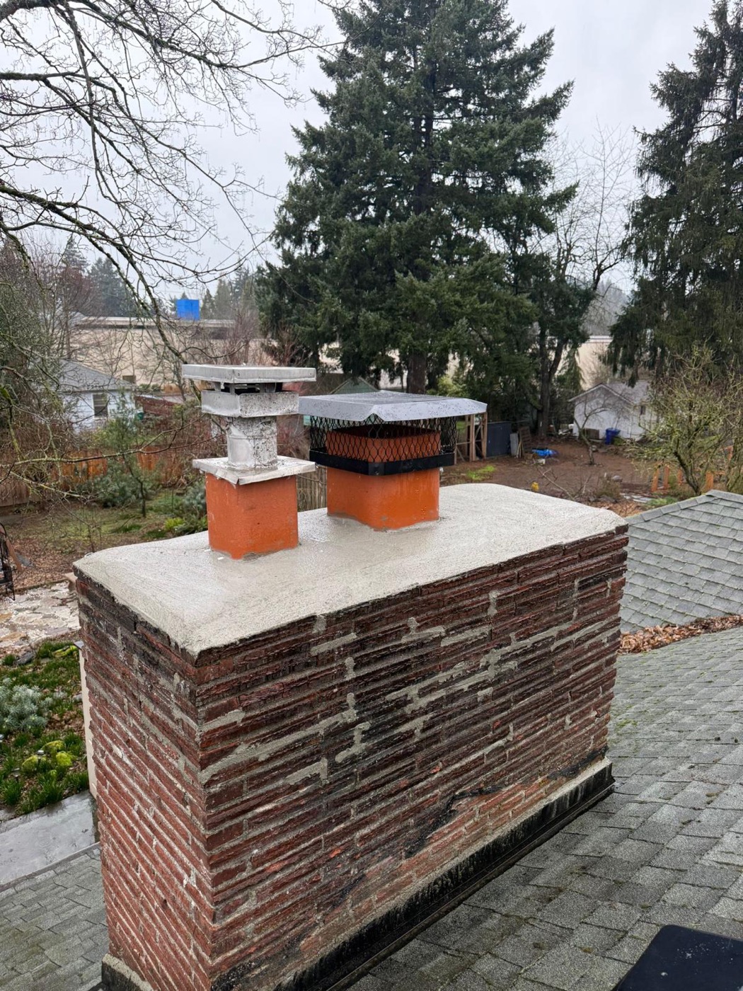 Long chimney rebuilt with new crown and caps